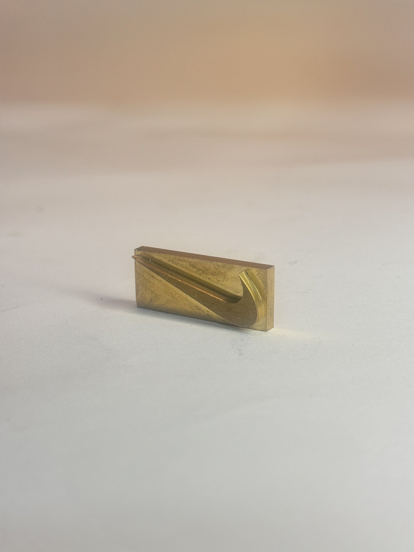 Mini swoosh brass stamps